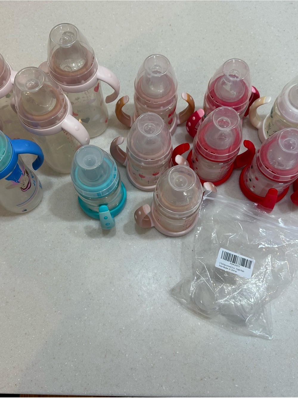 Nuk Assorted Baby Sippy Cups in Pink, Red, Blue & Teal w replacement nipples